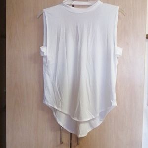 Free with purchase 2+ NWOT Tank Top..